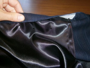 folding the top edge over the lining