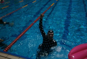 liz haywood in pool after race
