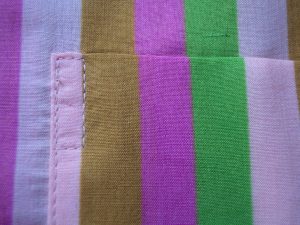 free pyjama pants pattern sewing step 3 detail of pocket stitching