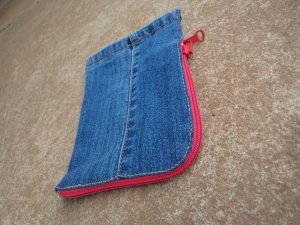 the-jeans-recycling-challenge-the-last-leg-little-zip-bag-three-quarter-view