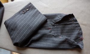 The Aquascutum Suit sleeve removed with pins