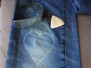 Visible mending heart marking template in chalk