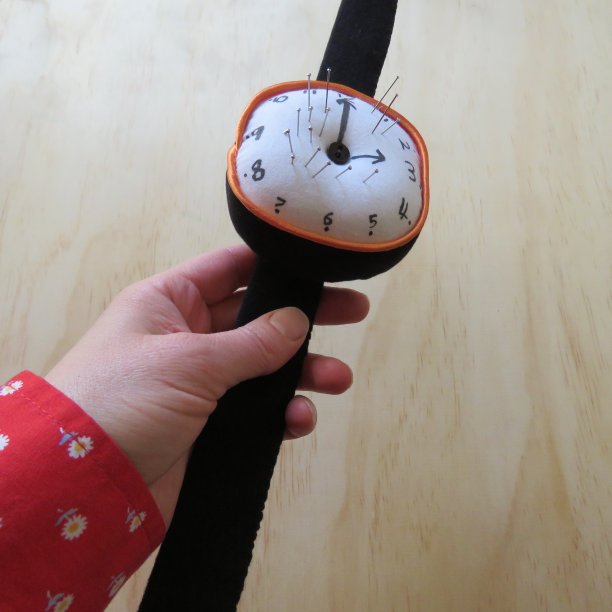Clock pincushion held