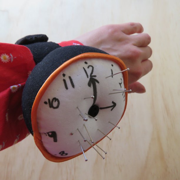Clock pincushion on wrist 3