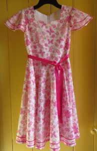 Country show dress on coat hanger