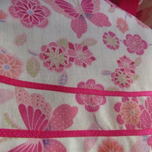 Country show dress ribbon closeup