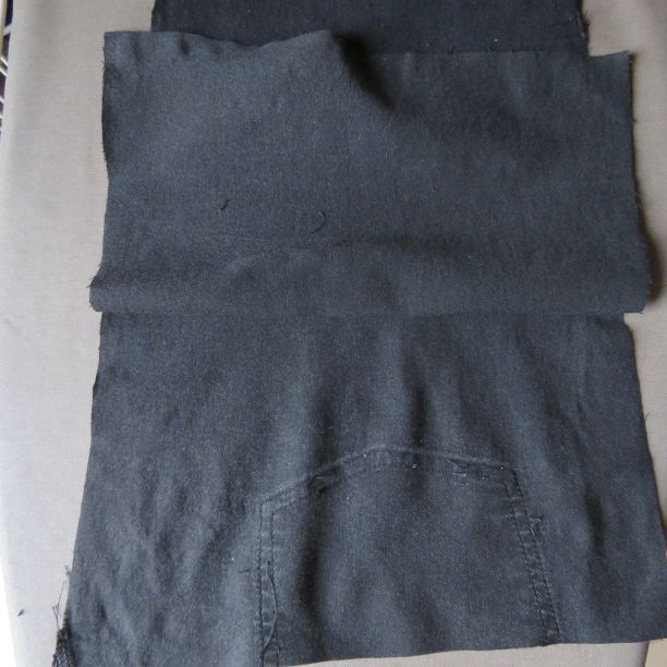 unpicking the back pockets to make a smith pinafore from old jeans