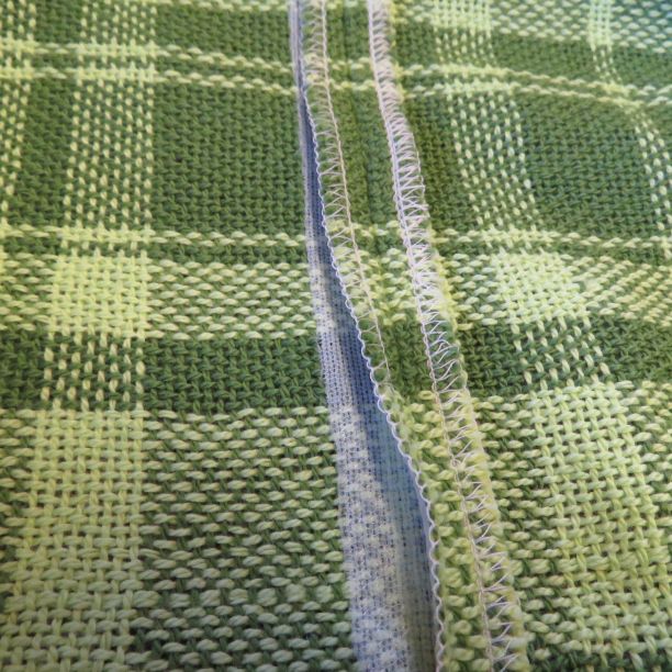 Seam in handwoven fabric