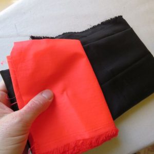 Fabrics for the Kiabi windbreaker -nylon ripstop in black and ORANGE!