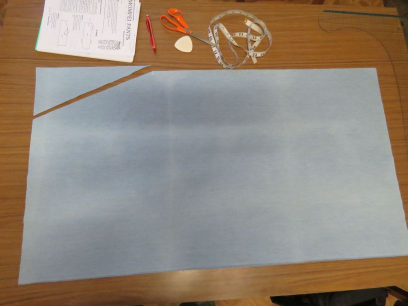 Cutting out mompei trousers in chambray