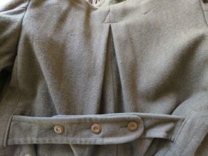 Back half belt on army coat