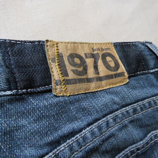 Back label reapplied onto the jeans