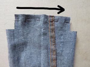 Sewing a waterbottle holder cut from jeans