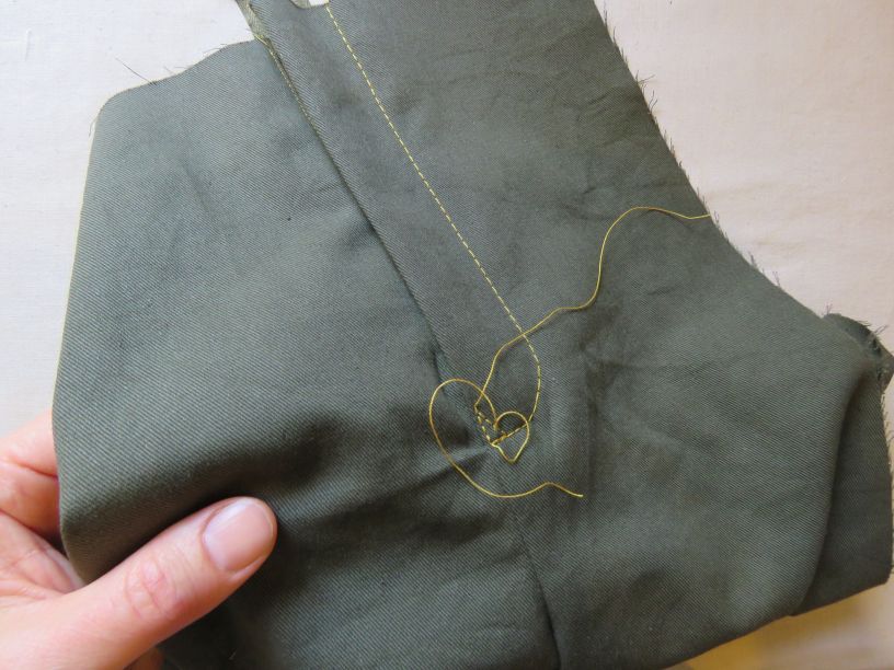 Reinforcing the bottom of the fly front zipper.