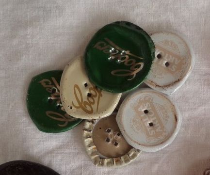 Buttons made from beer bottle tops.
