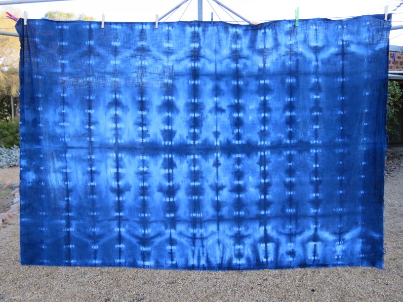 Large piece of indigo dyed fabric.