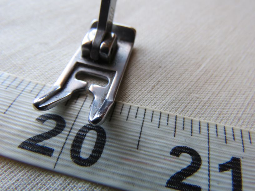 A 1/4" (6mm) foot for a sewing machine.