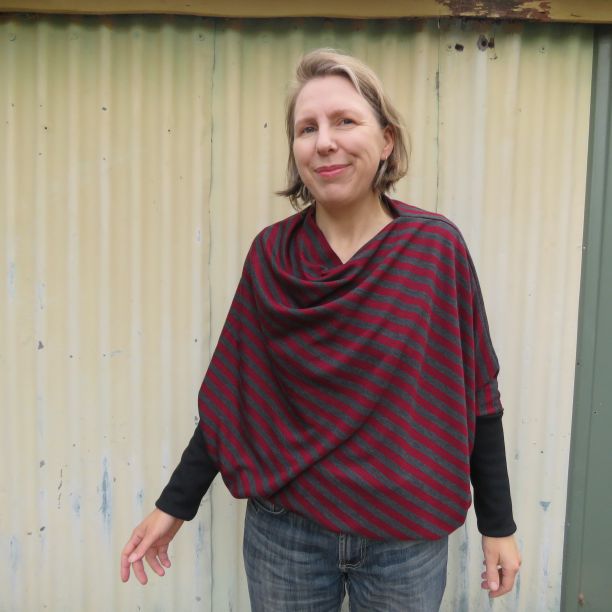 Liz Haywood wearing a striped top cut from a square of knit fabric.  This one has ribbing sleeves and waistband.
