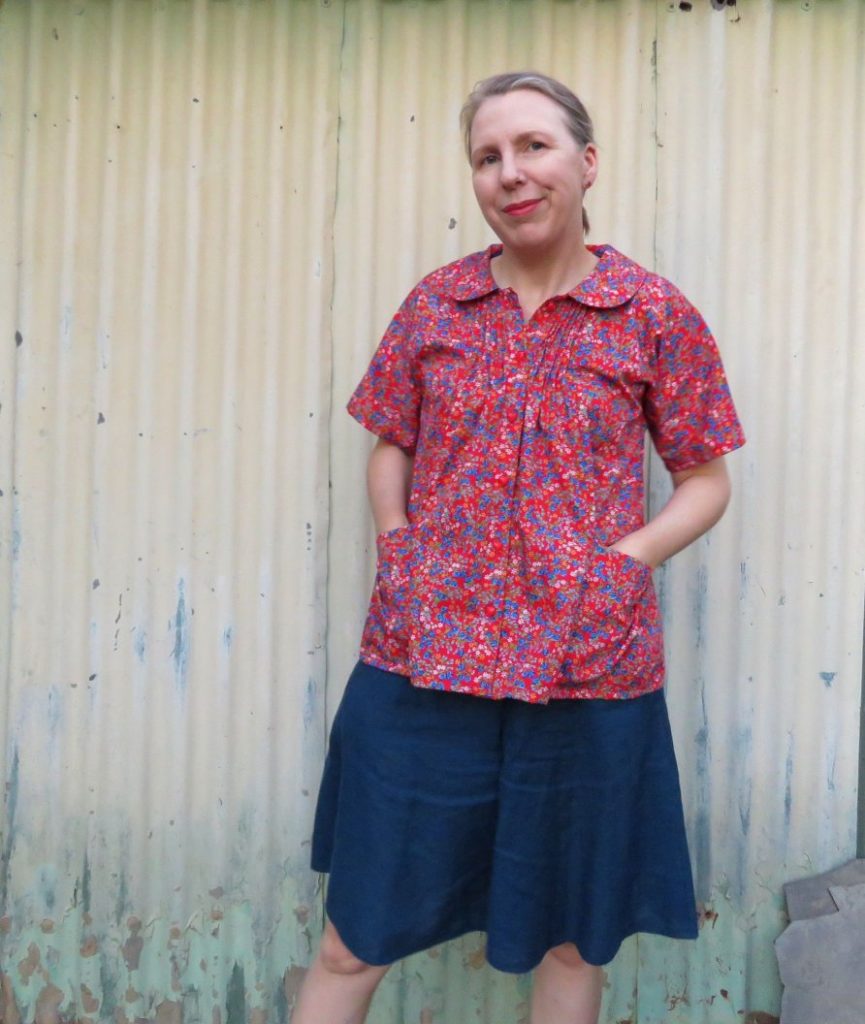 Red Petrea blouse worn with blue zero waste culottes.