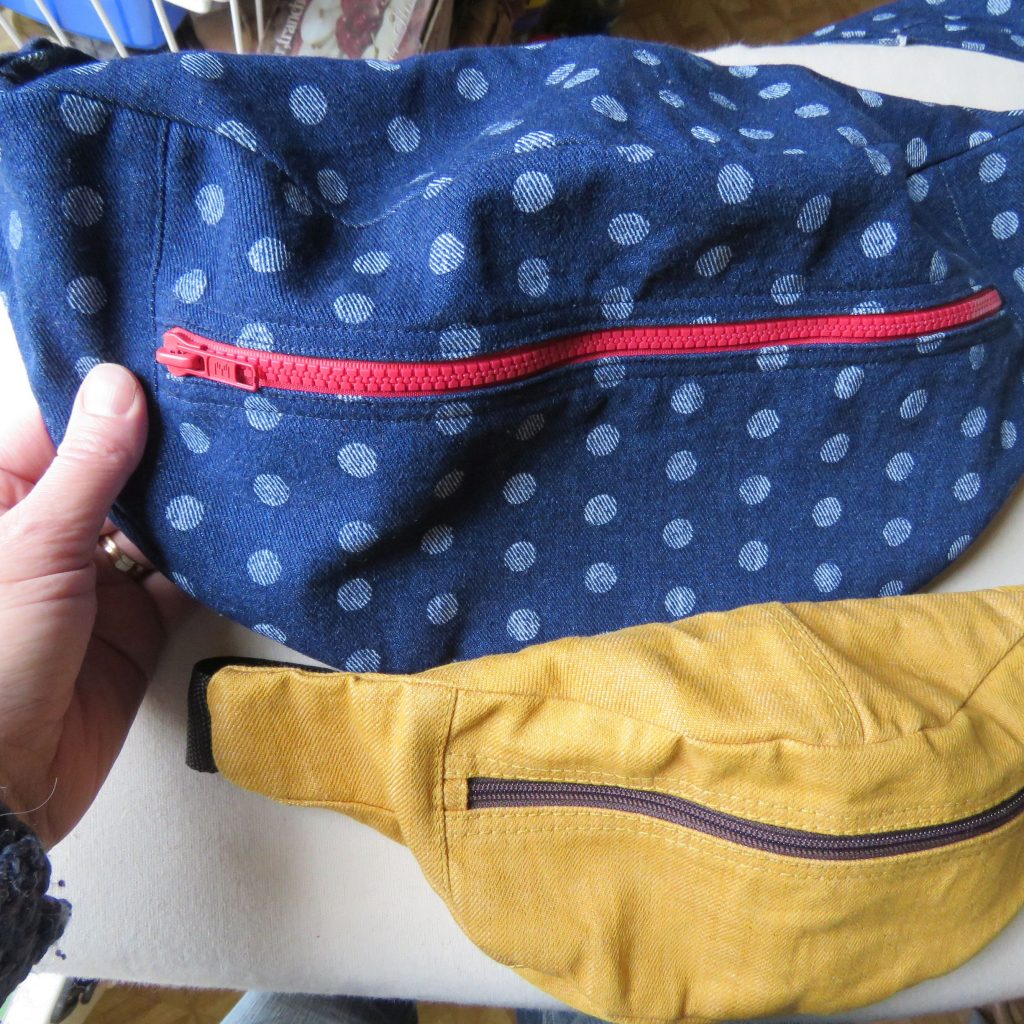 Two different sizes of bumbag shown together.